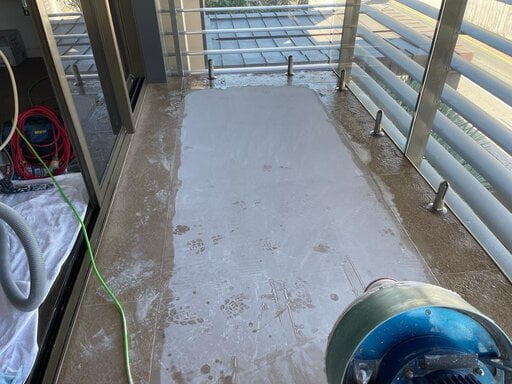 Stone grinding equipment in use